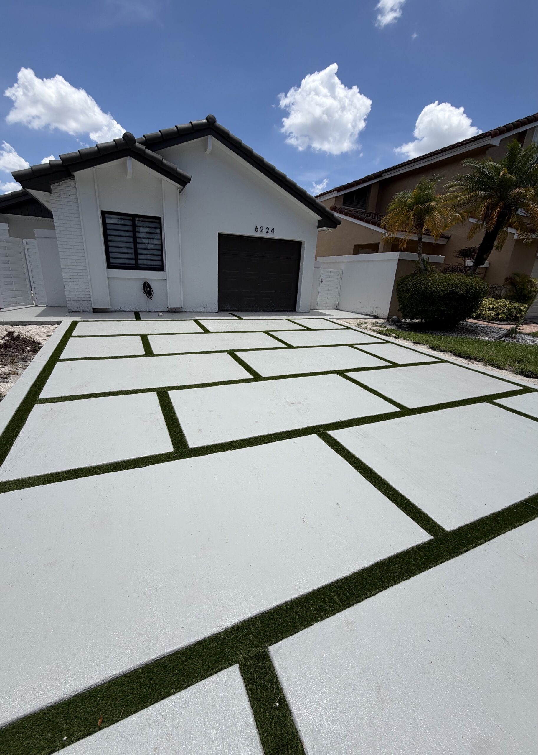 Hialeah home with concrete driveway